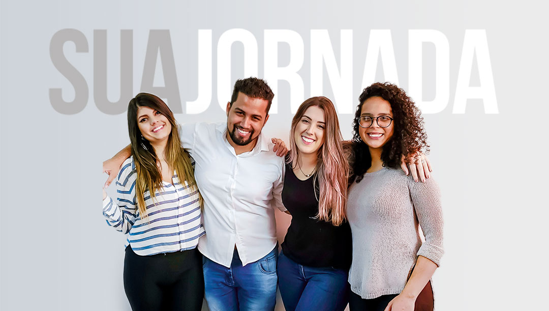 Grupo de jovens abraços e sorrido.