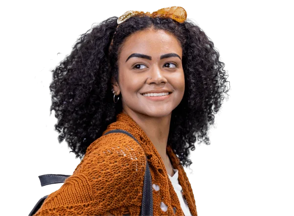 Intern holding a notebook and smiling