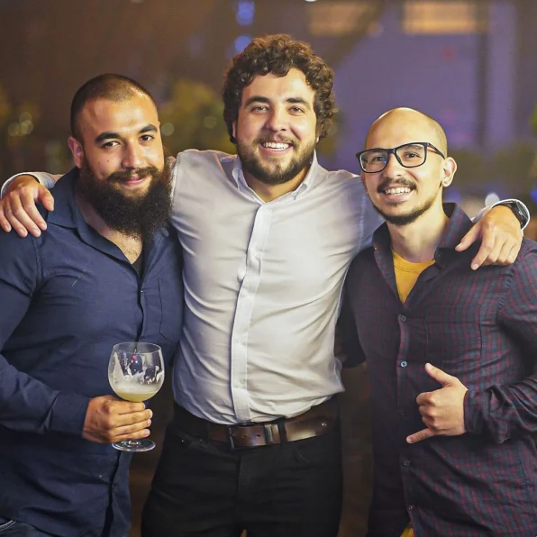 Employees at a party having a drink