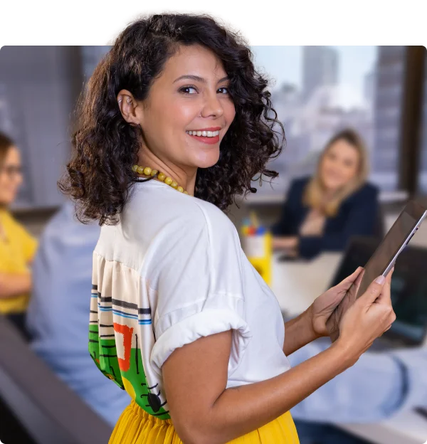 Curly-haired woman in an office